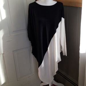 Thin poncho with ribbed sleeve